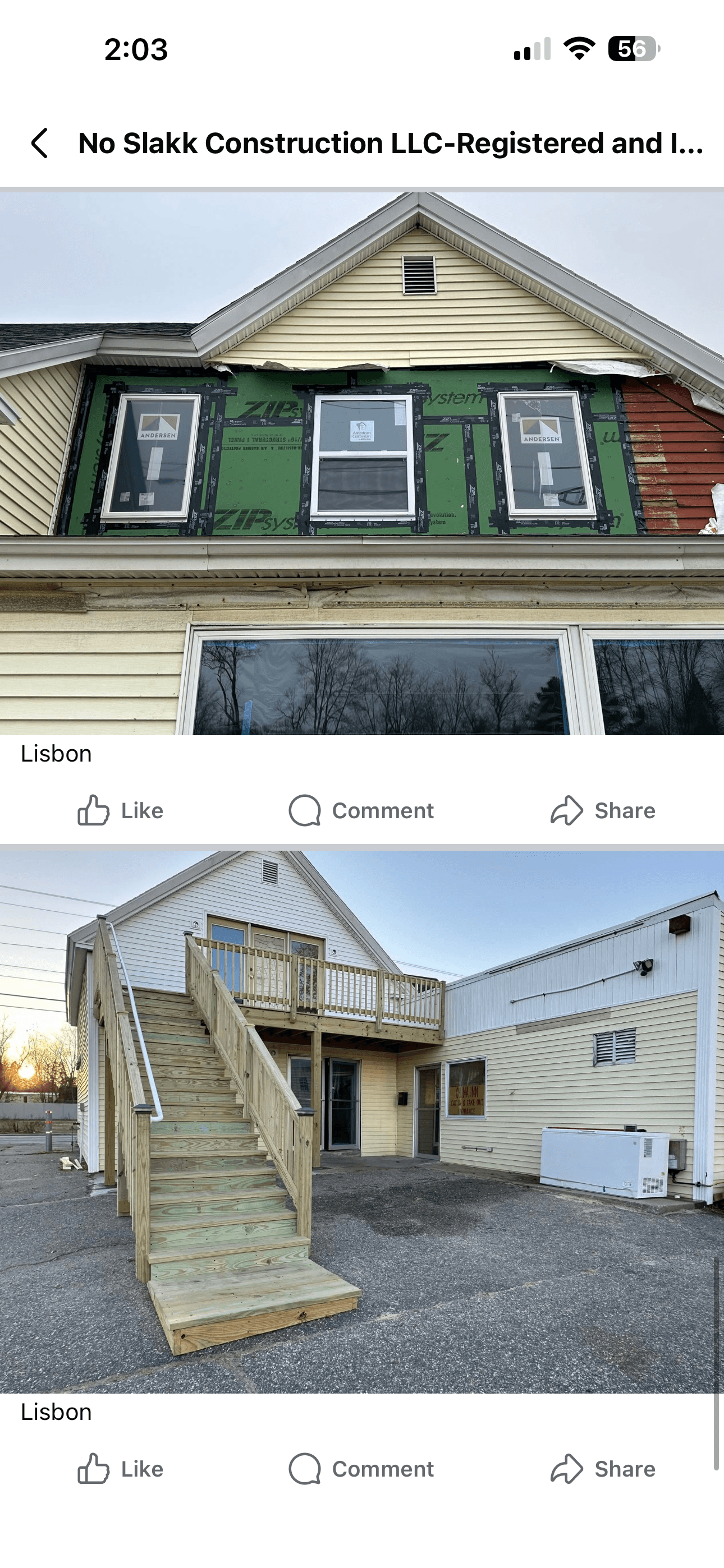 Construction progress showing new window installation and a newly built wooden exterior staircase and deck.